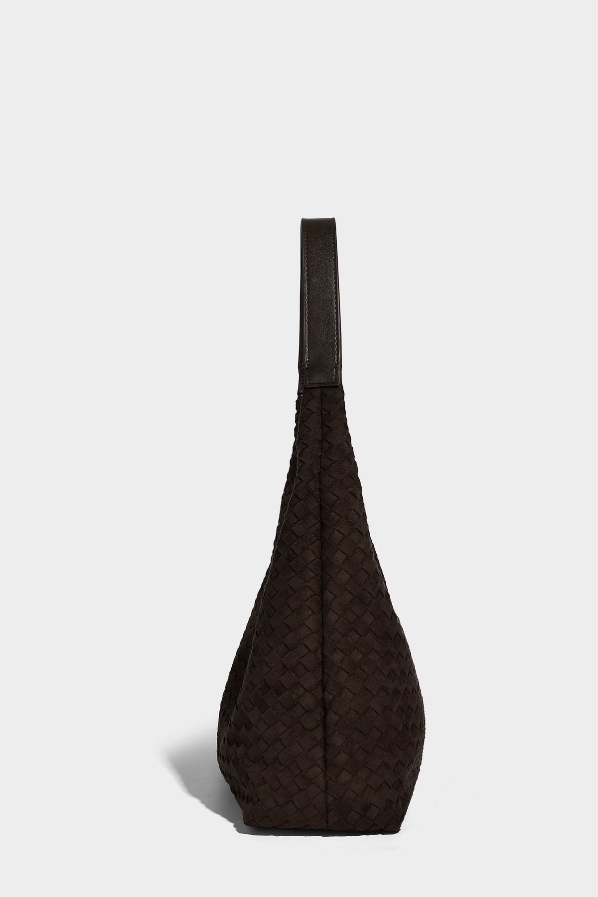 Large slouchy woven hobo tote bag with curved shoulder strap and triangular silhouette, detail view 14