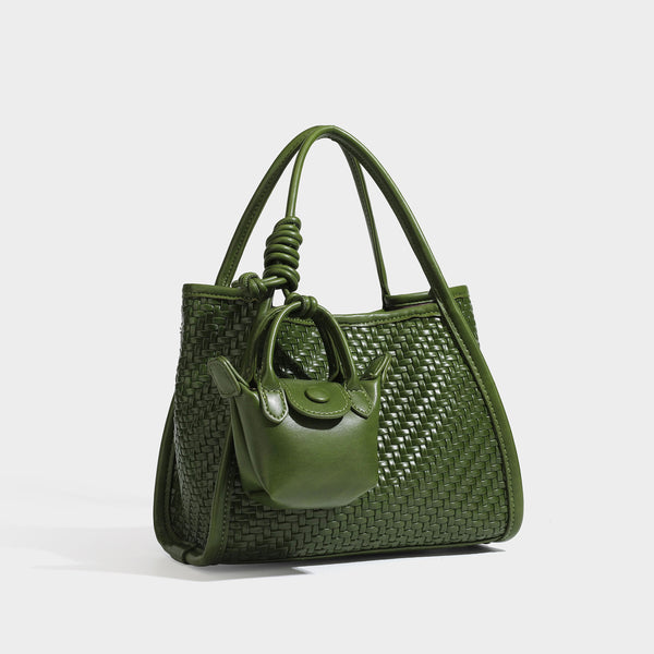 Strukturierte Tote Bag mit Webstruktur in Braun, glatten Besätzen in Lederoptik, geknoteten Tragegriffen und befestigtem Mini-Beutel mit Kordelzug