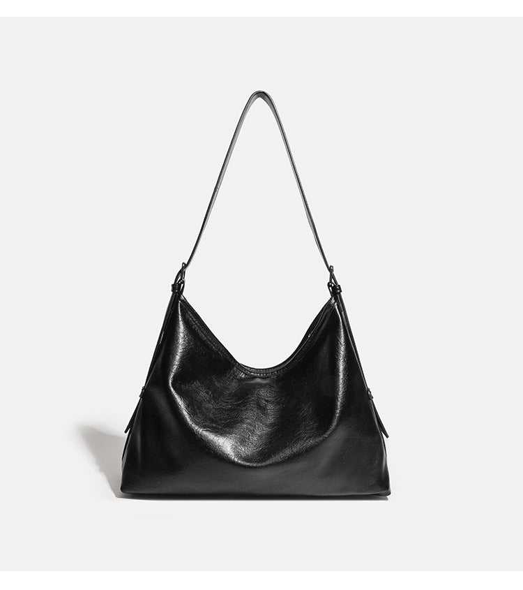 Lässige, große schwarze Schultertasche in Lederoptik mit Reißverschluss, breitem flachem Boden und langem verstellbarem Riemen, Detailansicht 9