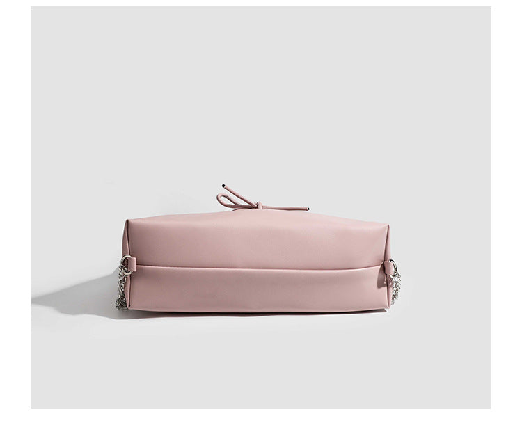 Glossy leather-look hobo shoulder bag with front bow lacing detail and silver-tone chain strap, detail view 20