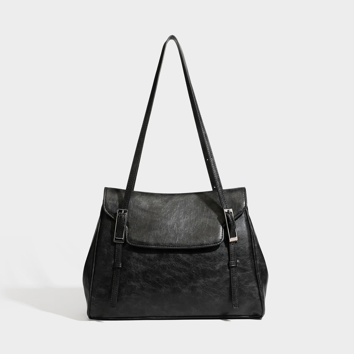 Structured flap-top shoulder tote bag in distressed leather-look finish with silver-tone buckle hardware and double shoulder