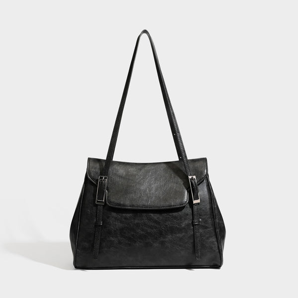 Structured flap-top shoulder tote bag in distressed leather-look finish with silver-tone buckle hardware and double shoulder