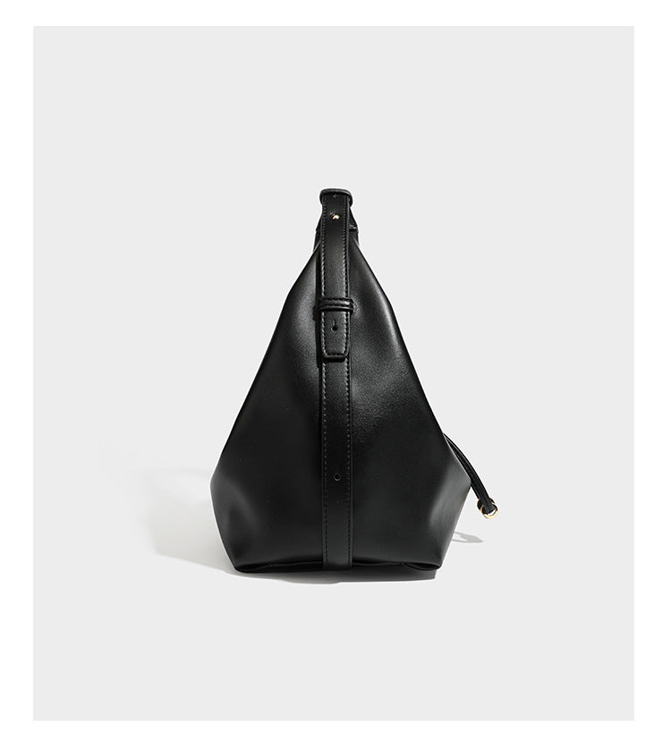 Slouchy hobo bag with smooth leather-look finish, drawstring cinch closure, and gold-tone bead hardware, detail view 9