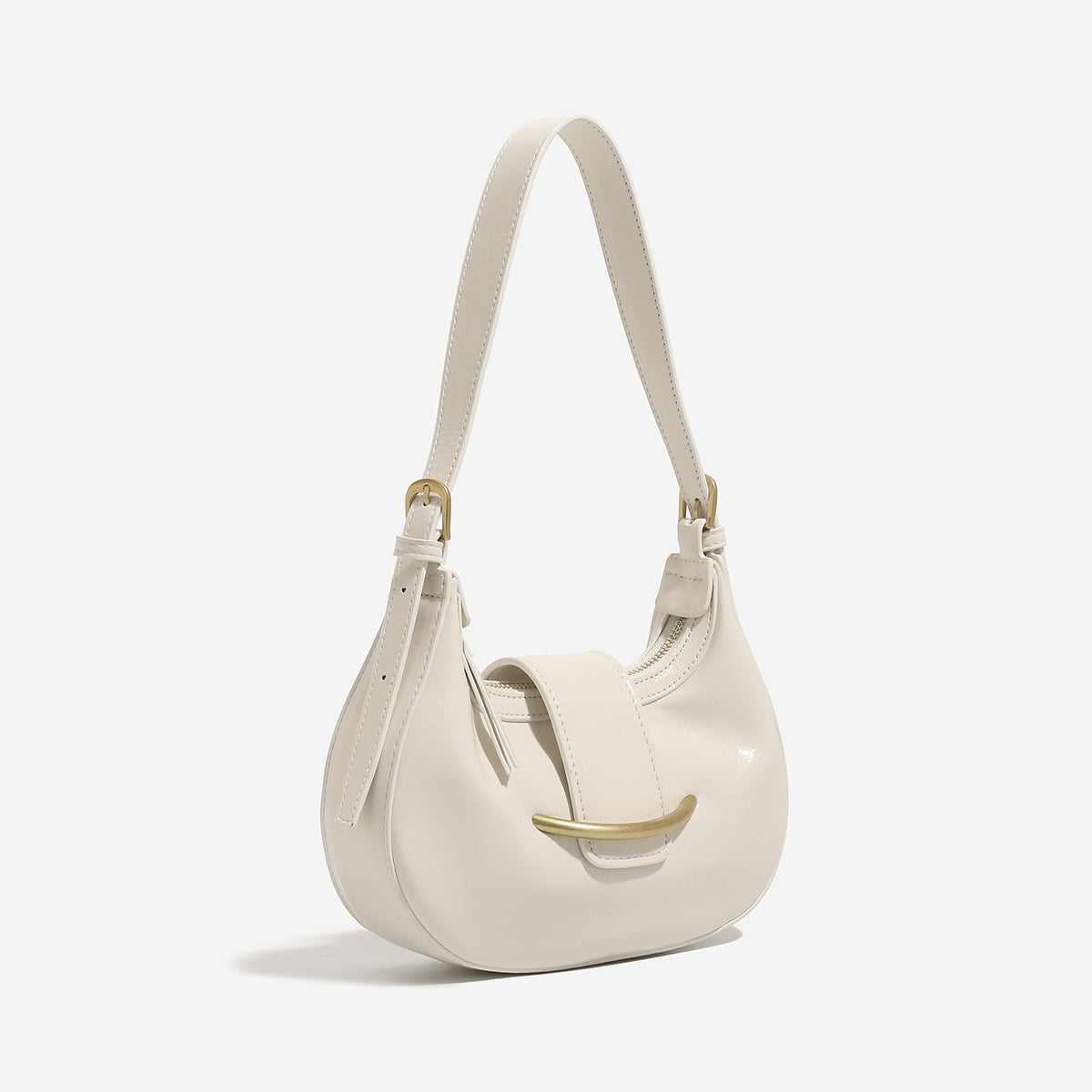 Compact crescent hobo shoulder bag with glossy synthetic finish, curved gold-tone front bar hardware, zip-top closure, and