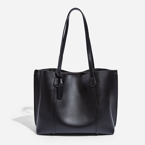 Large structured leather-look tote bag with belt-strap detail and gold-tone hardware, detail view 7