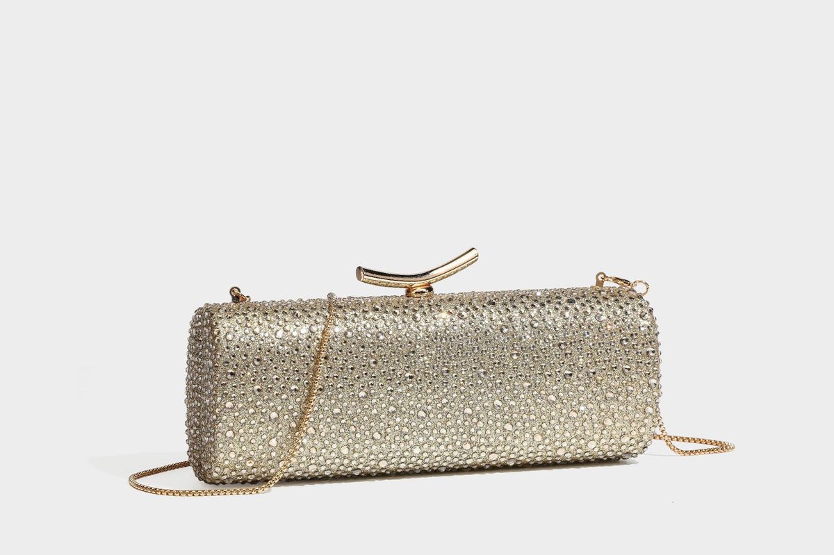 Structured rectangular hard-case clutch bag covered in all-over rhinestone crystal embellishment with curved kiss-lock top