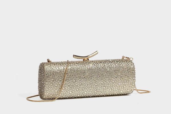 Structured rectangular hard-case clutch bag covered in all-over rhinestone crystal embellishment with curved kiss-lock top