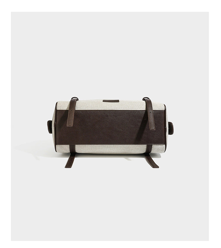 Cream canvas barrel shoulder bag with dark brown leather-look straps, trim, and silver-tone hardware, detail view 13