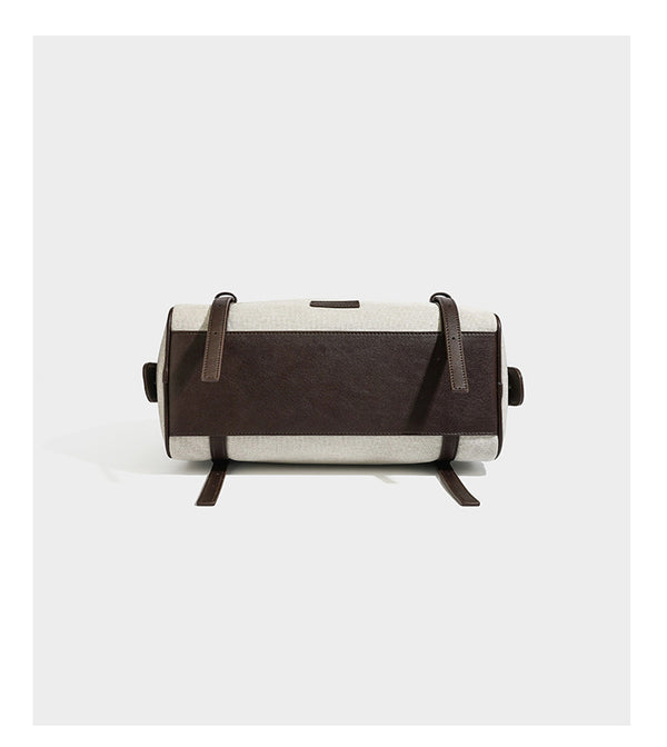 Cream canvas barrel shoulder bag with dark brown leather-look straps, trim, and silver-tone hardware, detail view 13