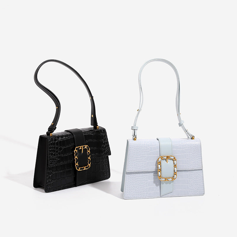 Structured crocodile-embossed flap shoulder bag with gold chain buckle hardware and adjustable strap, detail view 2