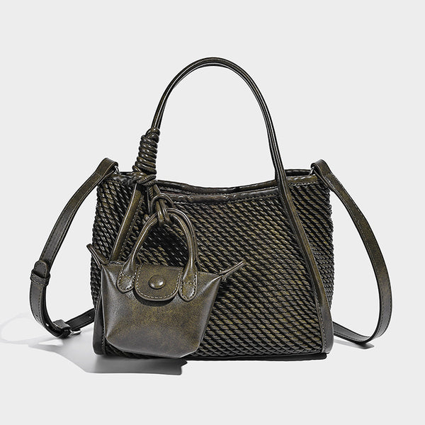 Large structured woven rope-texture tote bag with smooth leather-look trim, knotted dual top handles, detachable mini front