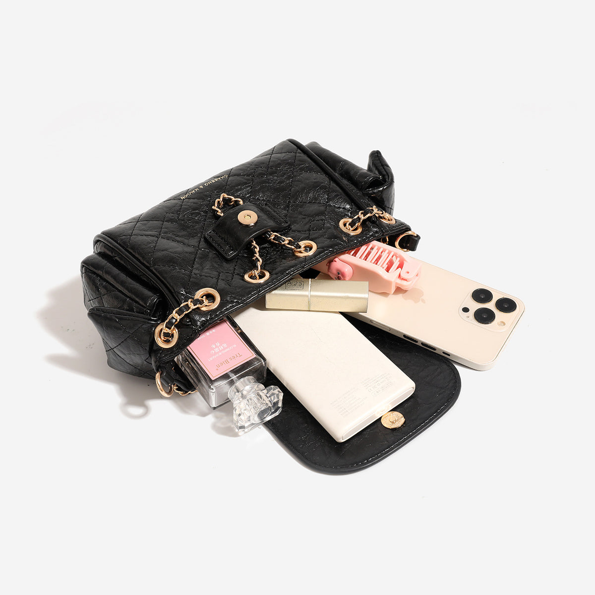 Small quilted diamond-pattern chain shoulder bag with flap closure and gold-tone hardware, detail view 4