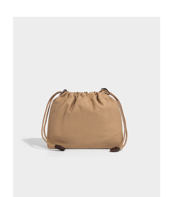 Woven leather-look hobo shoulder bag with braided strap and silver-tone hardware, detail view 16