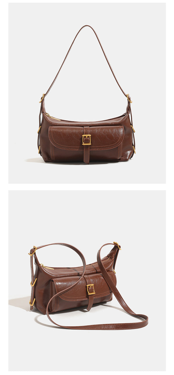 Compact glossy oil-wax leather-look shoulder bag with front buckle flap pocket and gold-tone hardware, detail view 11