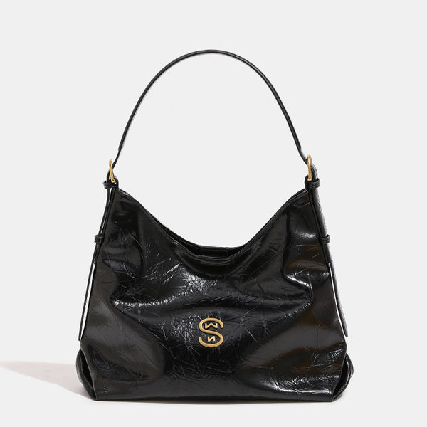 Glossy crinkled hobo shoulder bag with gold-tone logo hardware and adjustable strap, detail view 6