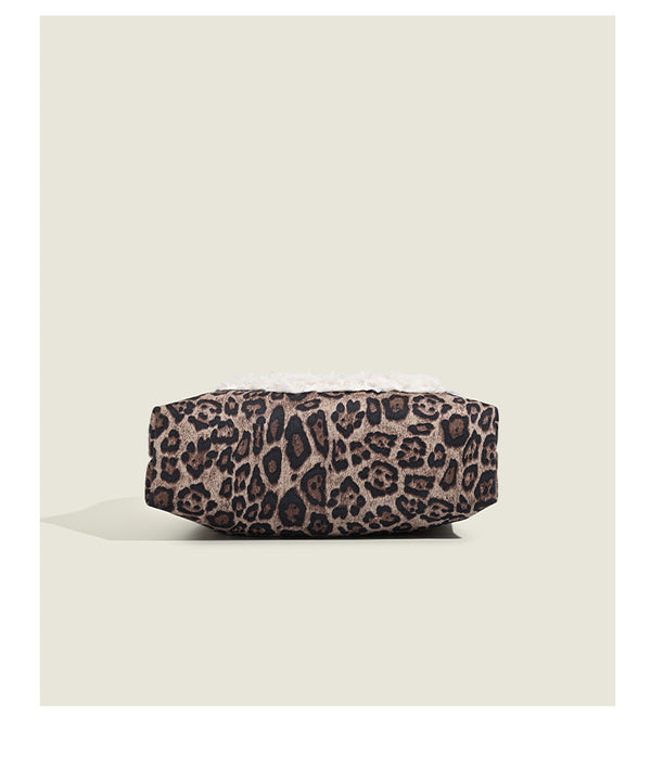 Leopard-print fabric tote bag with white plush teddy bear appliqué and brown leather-look shoulder straps, detail view 13