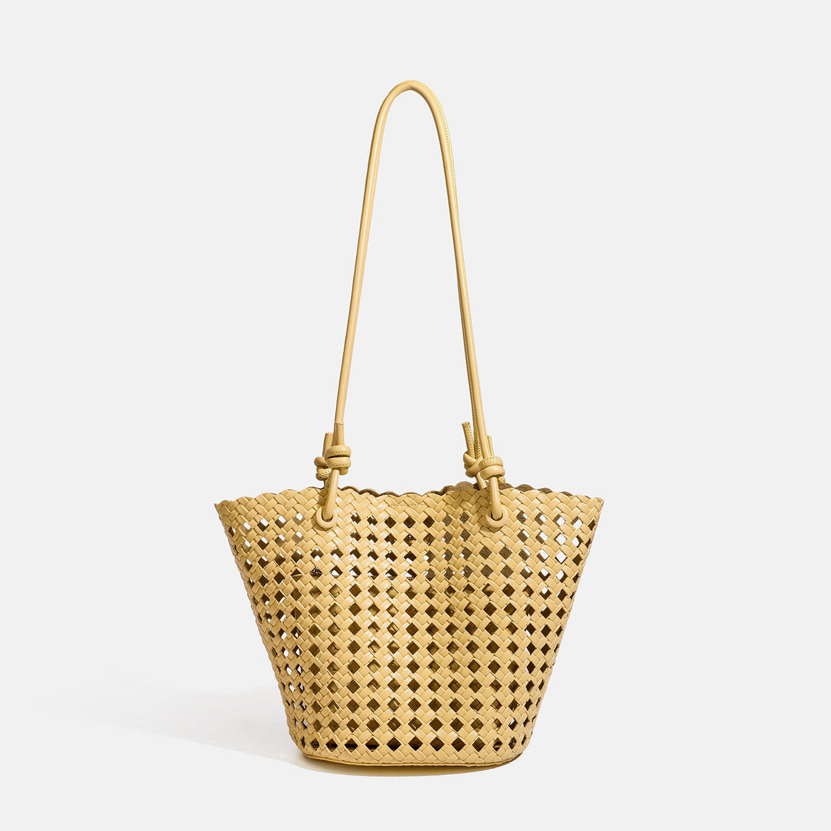 Open-weave lattice bucket tote bag with long knotted cord handles and tapered silhouette, detail view 12