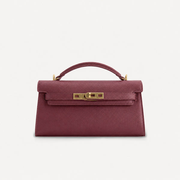 Strukturierte rechteckige Satchel-Tasche mit Krokodilprägung, goldfarbenem Drehverschluss und kurzem Henkel, Detailansicht 18