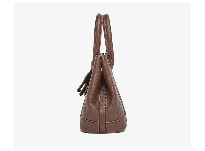 Structured pebbled leather-look top-handle tote bag with elephant charm and detachable shoulder strap, detail view 15