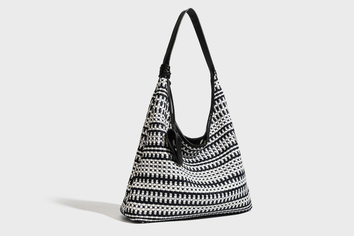 Slouchy woven stripe hobo shoulder bag with black-and-white pattern and leather-look strap, detail view 23