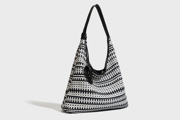 Slouchy woven stripe hobo shoulder bag with black-and-white pattern and leather-look strap, detail view 23