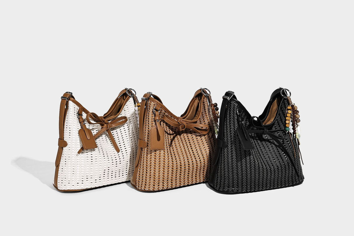 Slouchy open-weave shoulder tote bag with leather-look tan trim, tie-front closure, and long adjustable strap, detail view 7