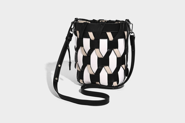 Small woven lattice bucket bag in tan and cream leather-look strips with drawstring top and detachable crossbody strap