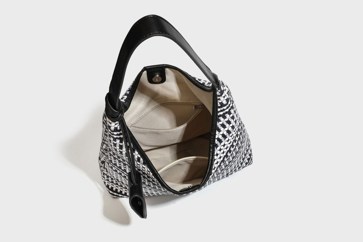 Slouchy woven stripe hobo shoulder bag with black-and-white pattern and leather-look strap, detail view 32