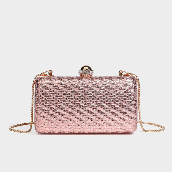 Small structured metallic woven-texture box clutch bag with jeweled kiss-lock dome clasp and slim gold chain strap, detail