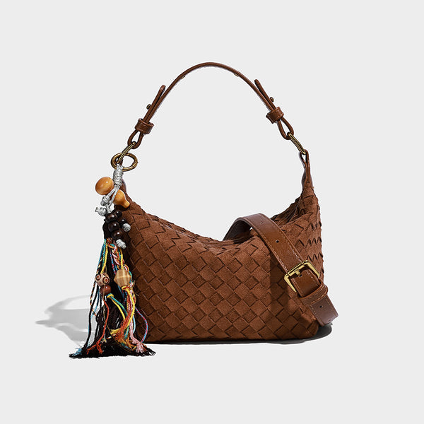Small woven-texture crescent hobo bag in dark chocolate brown with top zip closure, gold-tone hardware, and adjustable
