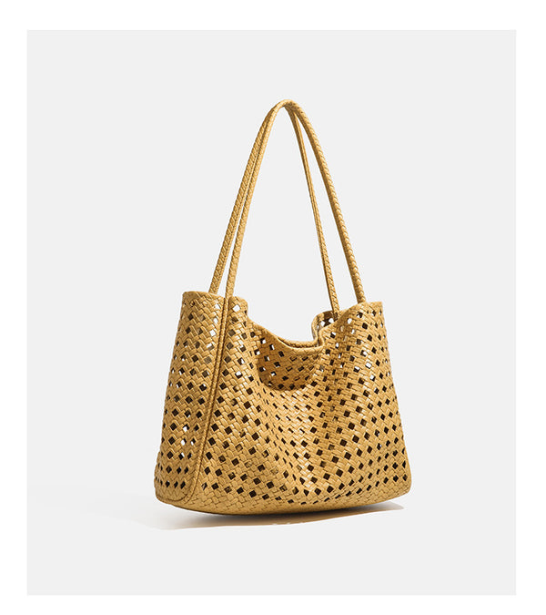 Slouchy open-lattice woven shoulder tote bag with long braided straps and matching zip pouch, detail view 16