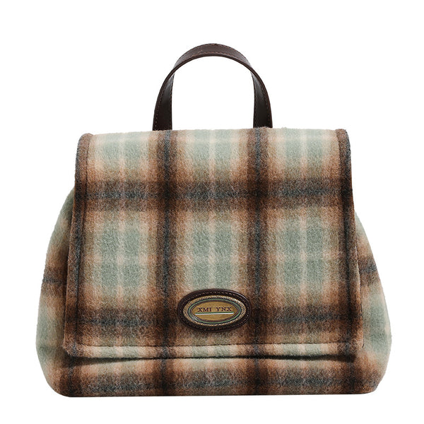 Structured plaid wool-blend flap backpack handbag in khaki sage and brown check with dark leather-look straps and antique