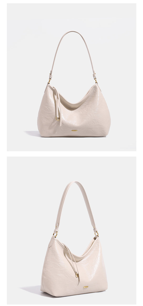 Large crinkled leather-look hobo shoulder bag with zip closure and gold-tone hardware, detail view 16