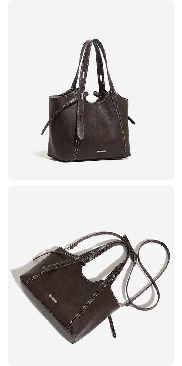 Strukturierte Tote-Bag in Used-Lederoptik mit kontrastierenden Steppnähten, seitlichem Bindebanddetail, zwei Tragegriffen oben und abnehmbarem