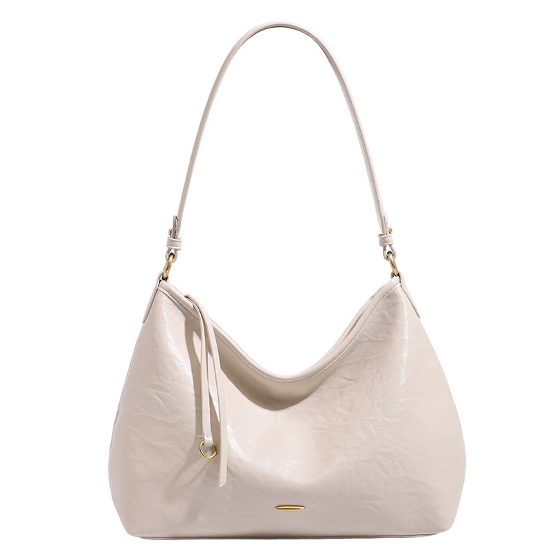 Large crinkled leather-look hobo shoulder bag with zip closure and gold-tone hardware, detail view 5