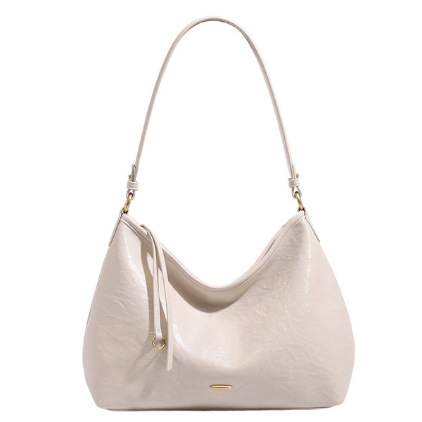 Large crinkled leather-look hobo shoulder bag with zip closure and gold-tone hardware, detail view 5