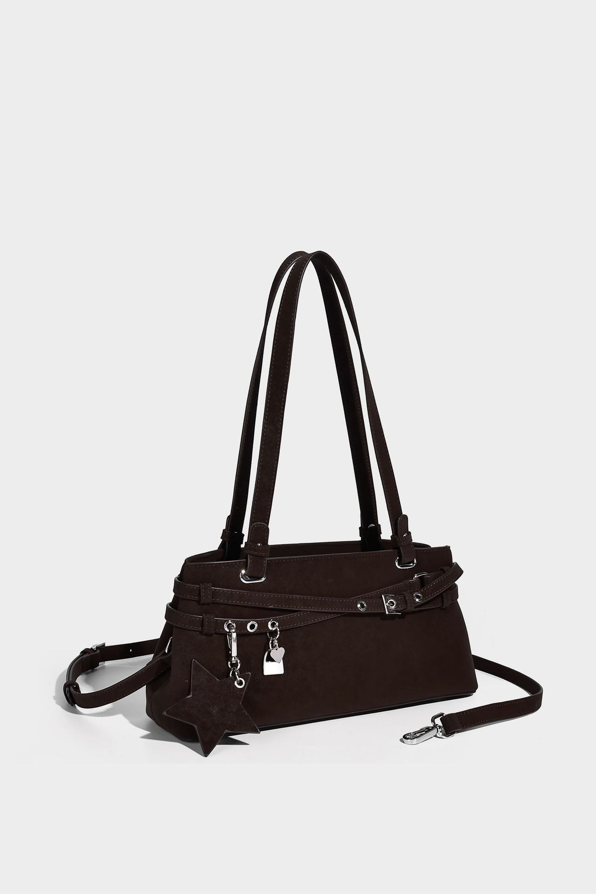 Structured trapezoid shoulder tote in dark brown matte suede-look finish with dual straps, wraparound belt bands