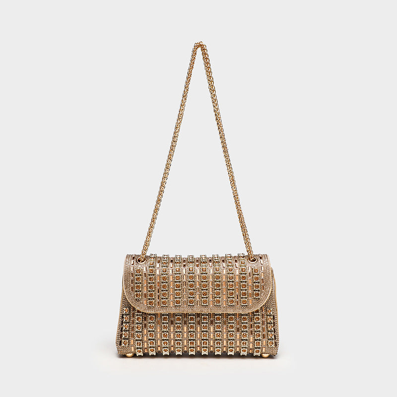 Structured mini flap crossbody bag covered in grid-set rhinestones with silver-tone chain strap, detail view 4