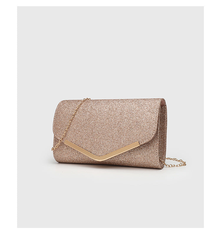 Structured glitter envelope clutch bag with gold-tone V-bar hardware and detachable chain strap, detail view 14