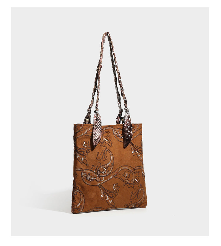 Brown suede-finish tote bag with paisley embroidery and braided fabric-ribbon shoulder strap, detail view 30