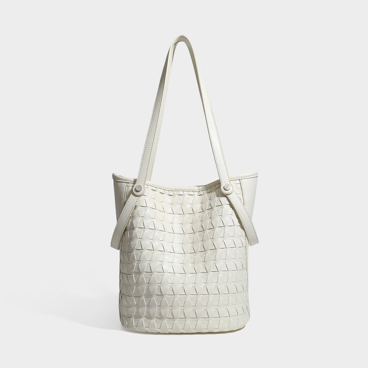 Brown embossed geometric woven leather-look bucket tote bag with dual shoulder straps, side snap hardware, and a round, front