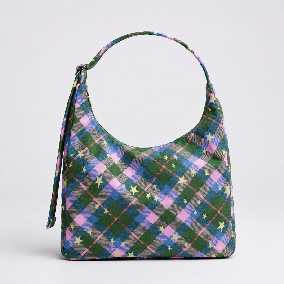 Multicolor plaid and star print hobo shoulder bag with knotted strap and silver-tone zip closure, front view