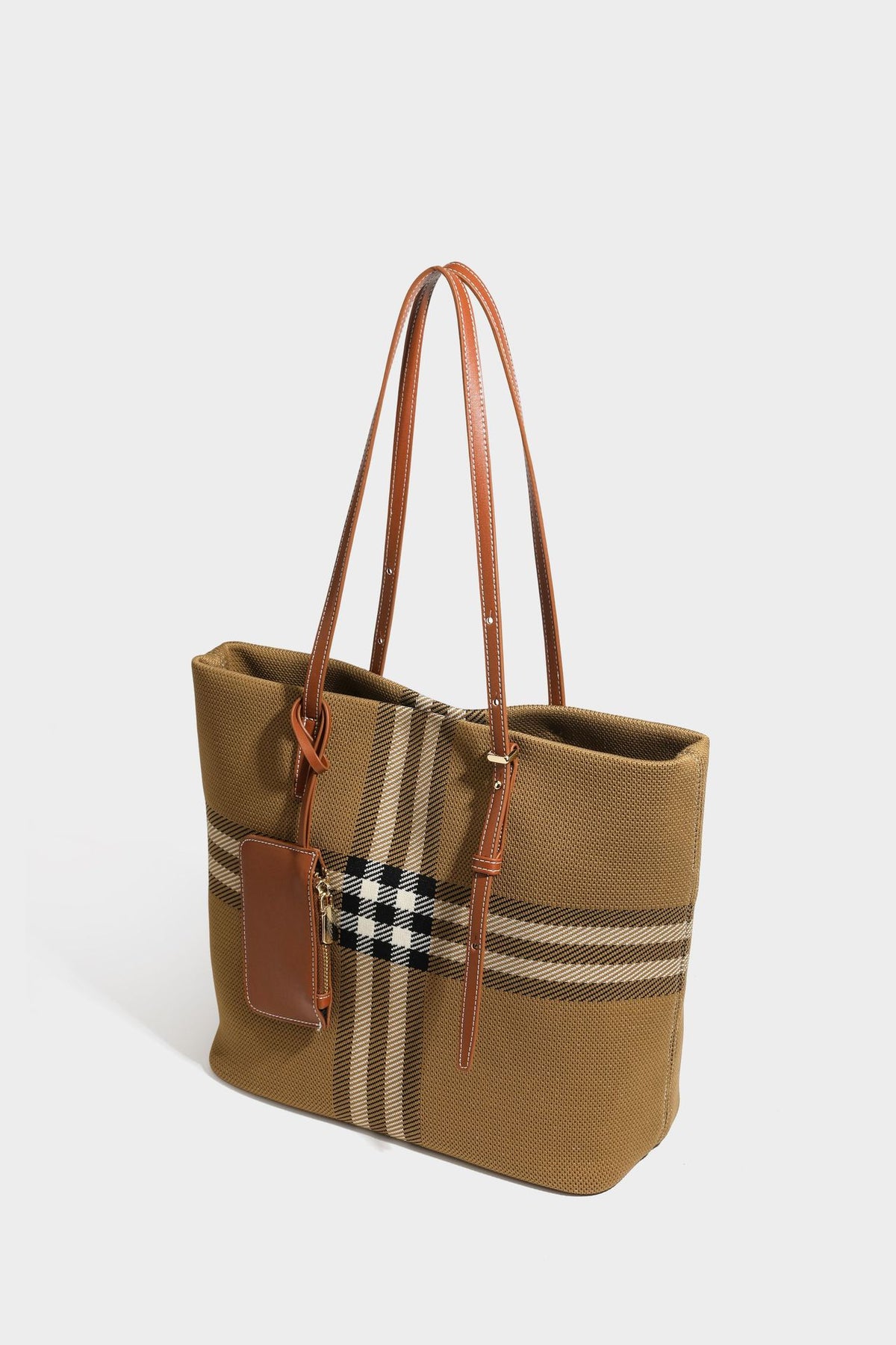 Large structured plaid check tote bag with smooth tan leather-look shoulder straps, attached front zip pouch, and gold-tone