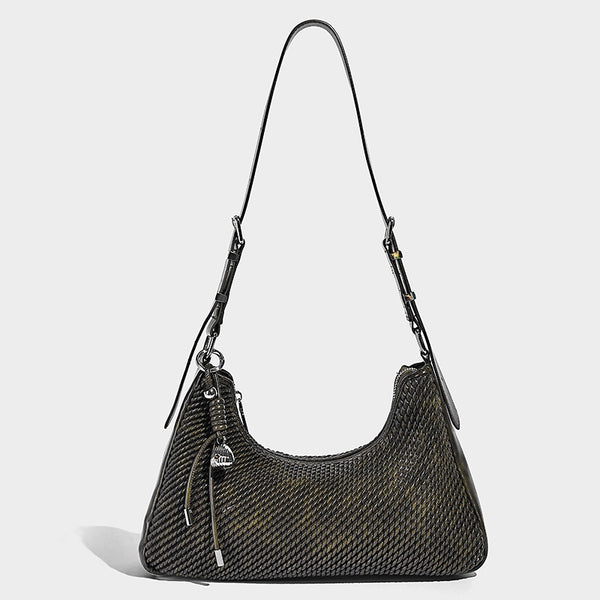 Woven crescent hobo shoulder bag with smooth side panels, zip-top closure, silver-tone charm hardware, and adjustable, detail