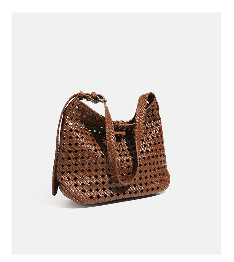 Brown open-lattice woven leather-look hobo shoulder bag with braided strap and matching zip pouch, detail view 19