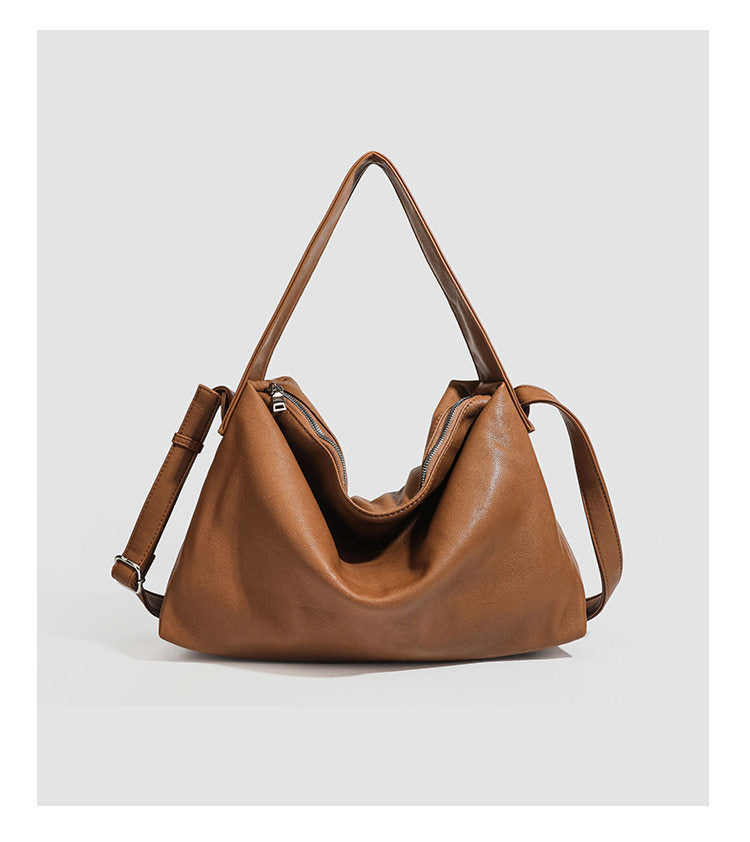 Slouchy leather-look hobo shoulder bag with top zipper and silver-tone hardware, detail view 6