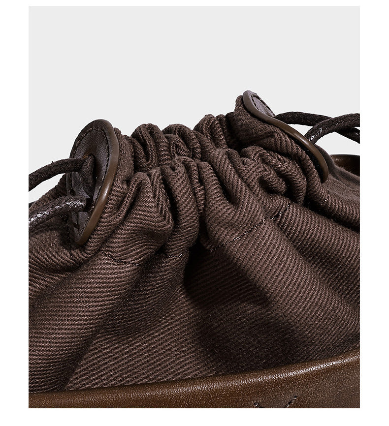 Kleine gewebte Bucket-Bag mit Karomuster-Einsatz, geflochtenem Tragegriff, Kordelzugverschluss, Perlenanhänger und abnehmbarem Schulterriemen