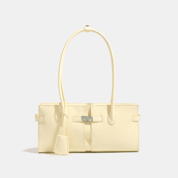 Structured glossy leather-look tote bag with long loop handles and silver turn-lock buckle closure, detail view 6