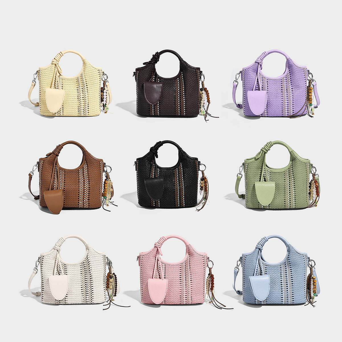Woven bucket tote bag in pastel blue with braided top handles, front slip pocket, beaded charm, and detachable crossbody