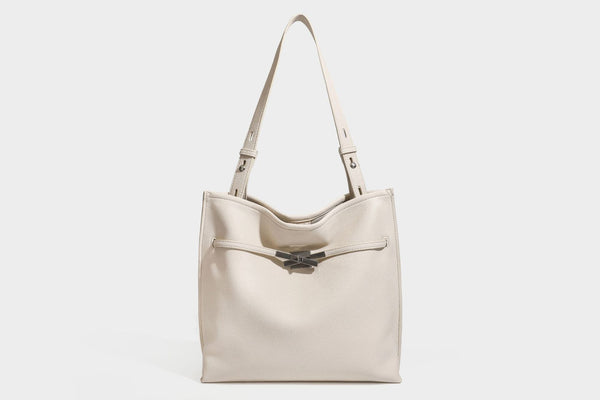 Pebbled leather-look tote bag with front toggle hardware and long shoulder strap, detail view 36